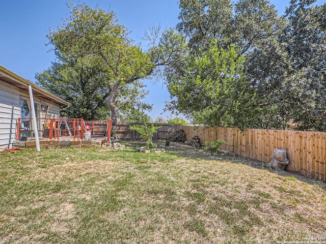 view of yard with a deck