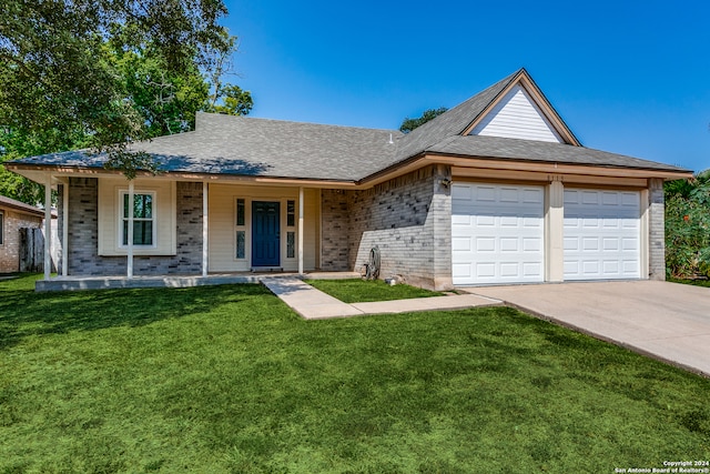 ranch-style house featuring a garage, a porch, and a front yard