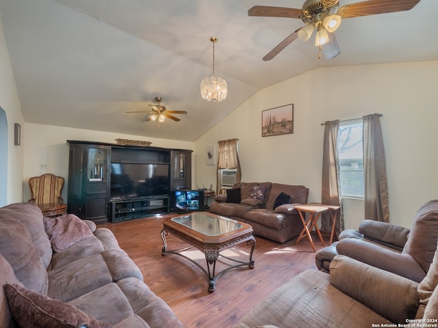 living room featuring ceiling fan with notable chandelier, lofted ceiling, cooling unit, and dark hardwood / wood-style floors