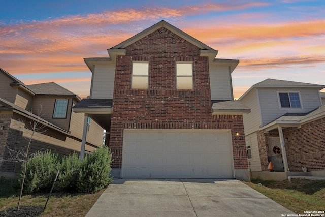 front of property featuring a garage