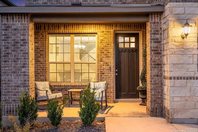232 Wickersham, Boerne, TX 78015 - doorway to property with brick siding