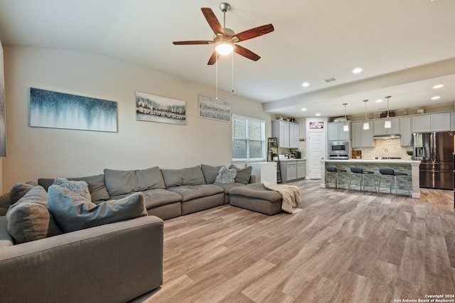 232 Wickersham, Boerne, TX 78015 - living area featuring recessed lighting, vaulted ceiling, a ceiling fan, and light wood-type flooring