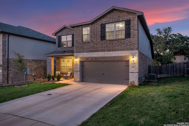 232 Wickersham, Boerne, TX 78015 - traditional-style home featuring brick siding, an attached garage, a lawn, and driveway