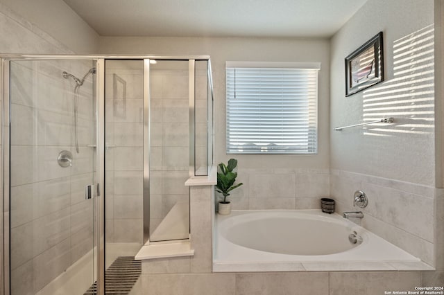 232 Wickersham, Boerne, TX 78015 - full bathroom with a shower stall and a garden tub