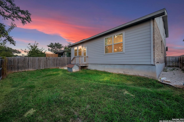 232 Wickersham, Boerne, TX 78015 - back of property featuring a fenced backyard and a yard