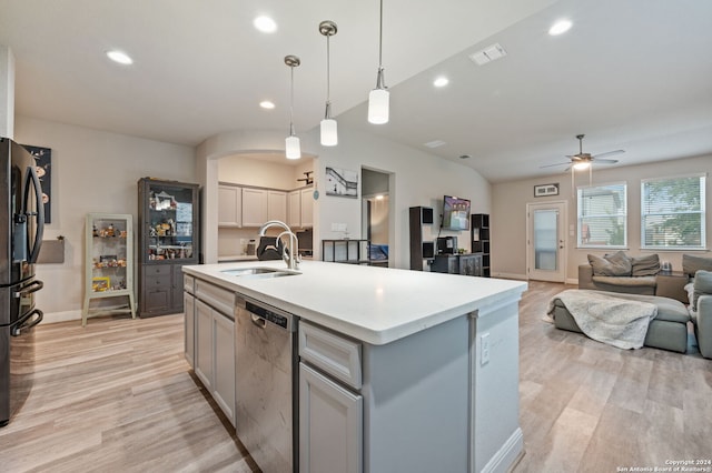 232 Wickersham, Boerne, TX 78015 - kitchen featuring a sink, dishwasher, arched walkways, light wood-style flooring, and a ceiling fan