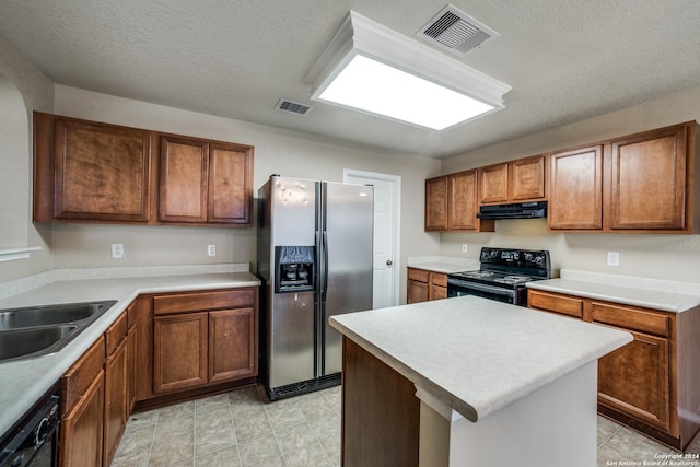 2815 Bandbury Oak, San Antonio, TX 78247 - kitchen with a sink, visible vents, black appliances, and under cabinet range hood