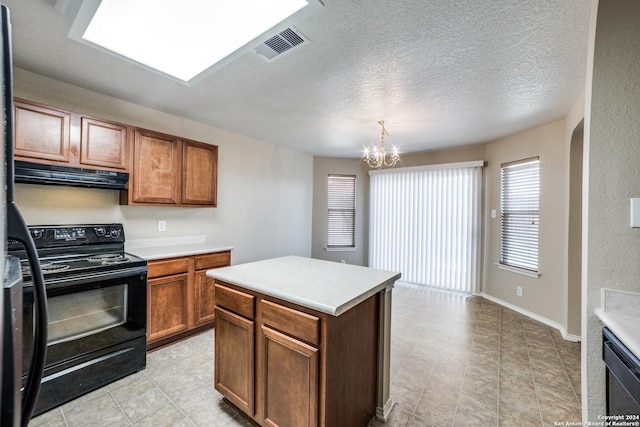 2815 Bandbury Oak, San Antonio, TX 78247 - kitchen with under cabinet range hood, visible vents, light countertops, and black / electric stove