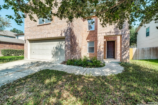 2815 Bandbury Oak, San Antonio, TX 78247 - view of front facade featuring driveway, a front yard, brick siding, a garage, and fence