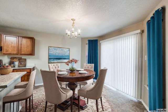 2815 Bandbury Oak, San Antonio, TX 78247 - dining room with a textured ceiling, light colored carpet, and a notable chandelier