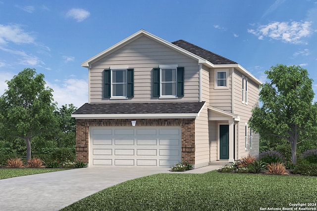 view of front property with a garage and a front lawn