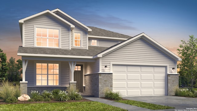 view of front facade featuring a garage and a porch