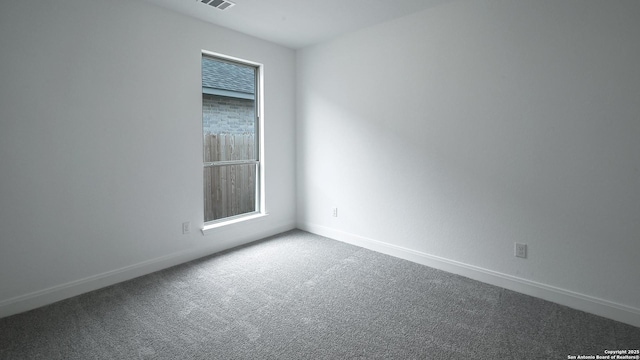 view of carpeted spare room