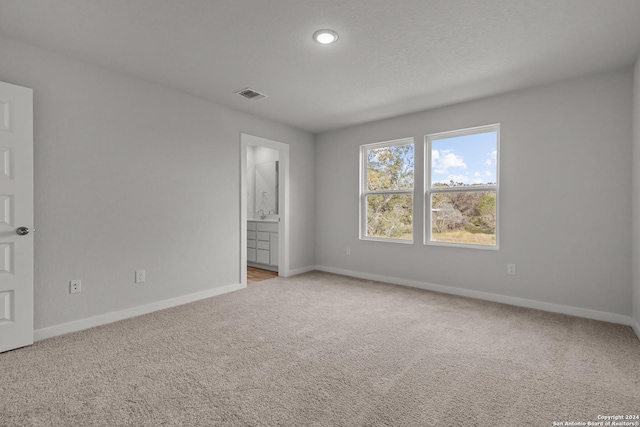 empty room with light carpet