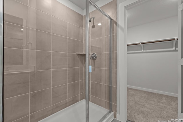 bathroom featuring an enclosed shower