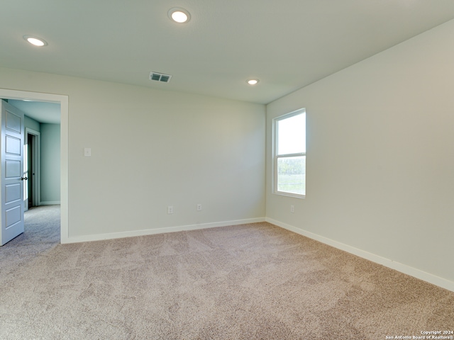 empty room with light carpet