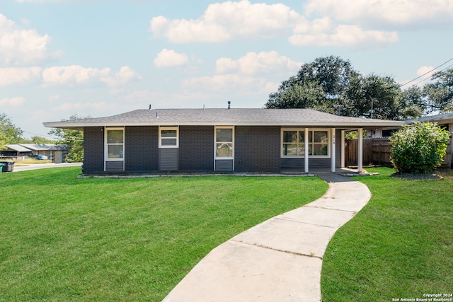 single story home with a front yard