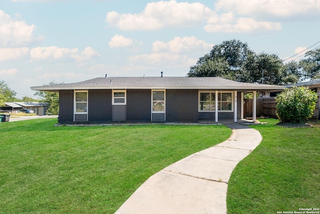 214 Oriole, San Antonio, TX 78228 - ranch-style house featuring fence, a front lawn, and brick siding