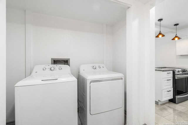 214 Oriole, San Antonio, TX 78228 - laundry room with marble finish floor and independent washer and dryer