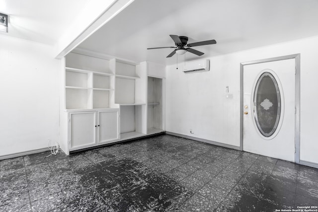 unfurnished living room with ceiling fan and a wall mounted AC