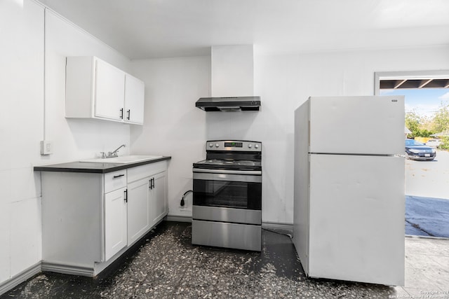 kitchen featuring wall chimney exhaust hood, stainless steel electric stove, sink, white cabinets, and white fridge