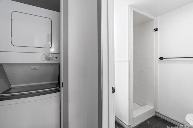 214 Oriole, San Antonio, TX 78228 - washroom featuring stacked washer and clothes dryer