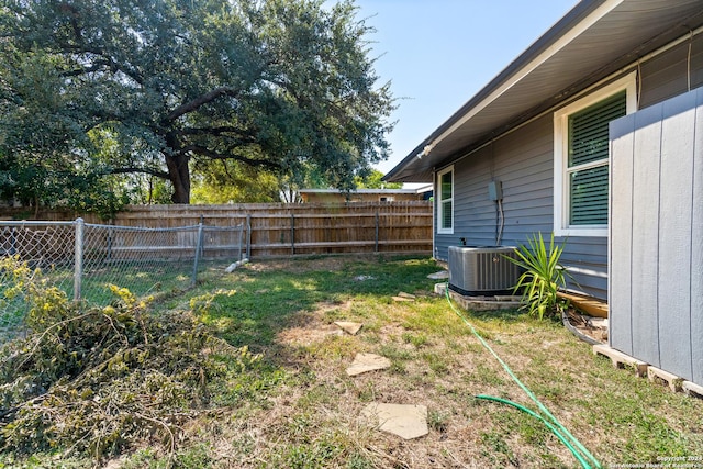 214 Oriole, San Antonio, TX 78228 - view of yard featuring central air condition unit and fence