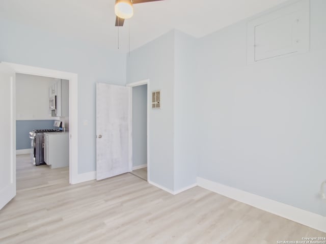 spare room with light hardwood / wood-style floors