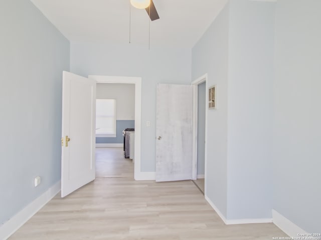 hallway featuring light hardwood / wood-style flooring