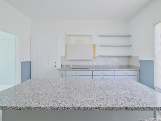 kitchen featuring white cabinetry