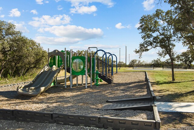 view of play area featuring a yard