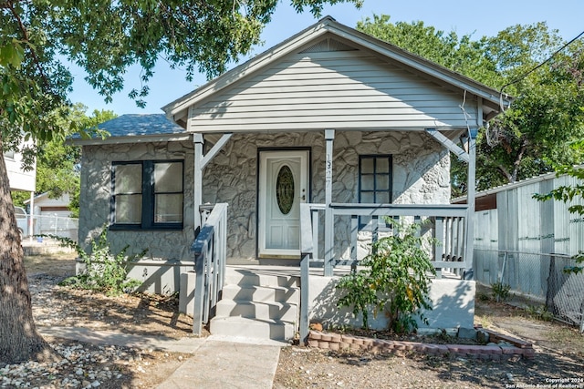 bungalow-style house featuring covered porch