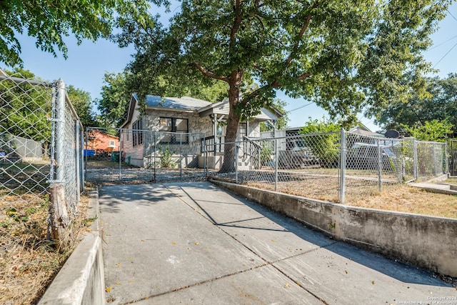 view of gate with fence