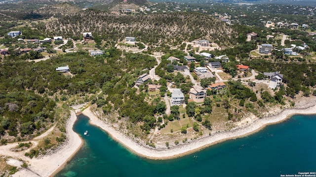 drone / aerial view with a view of the beach and a water view