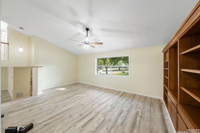 unfurnished living room with ceiling fan, light hardwood / wood-style flooring, and vaulted ceiling