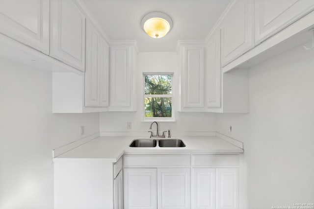 kitchen with white cabinets and sink