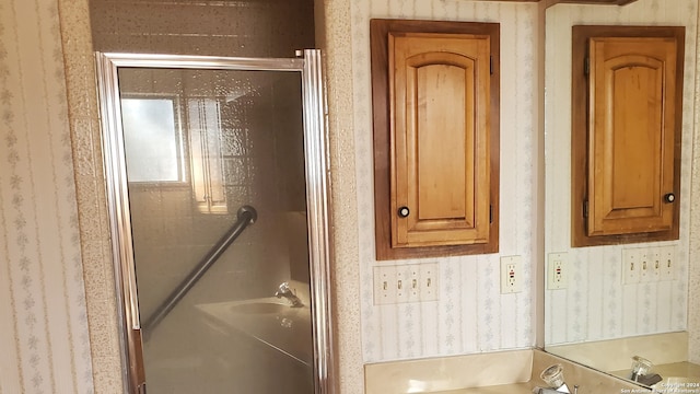 bathroom featuring walk in shower