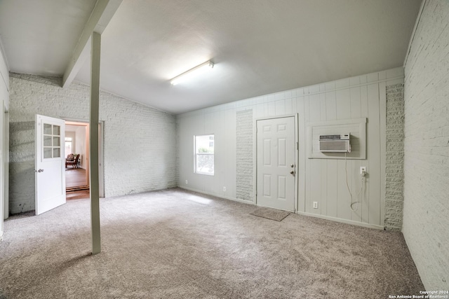 119 Rolling Grn, San Antonio, TX 78228 - interior space with a wall mounted air conditioner, lofted ceiling with beams, and carpet flooring