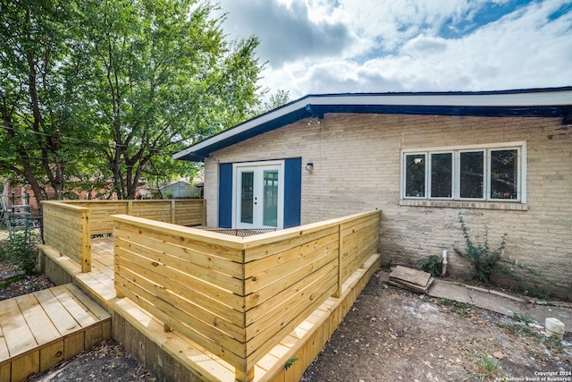 view of property exterior with french doors