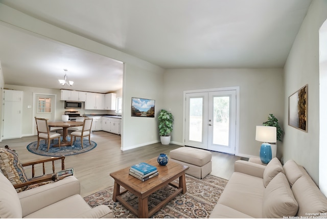 119 Rolling Grn, San Antonio, TX 78228 - living room with baseboards, french doors, and light wood-type flooring