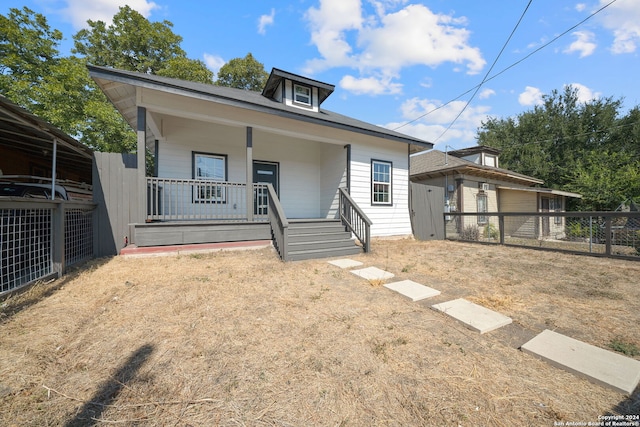 bungalow featuring covered porch