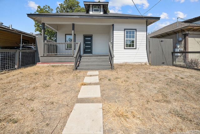 bungalow-style home with a porch