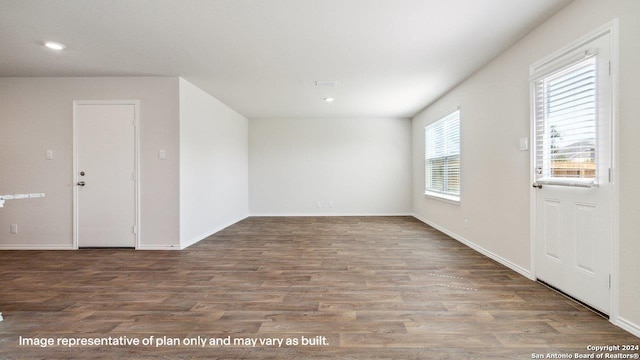 interior space with hardwood / wood-style floors