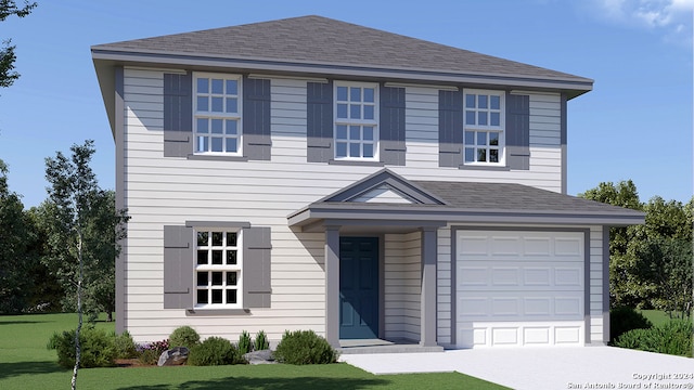 view of front facade with a garage and a front lawn