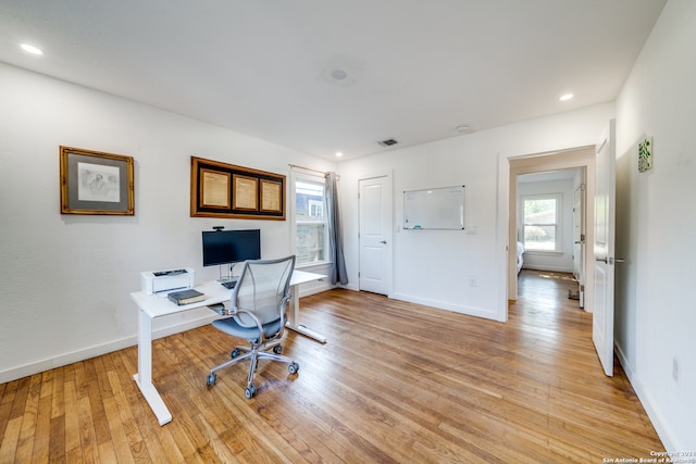 office space featuring light wood-type flooring