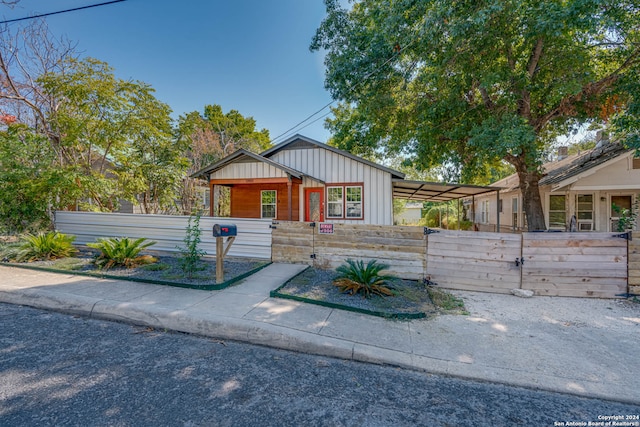 view of front facade with a carport