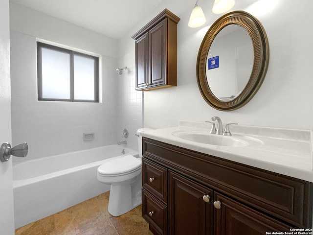 full bathroom with toilet, tile patterned flooring, vanity, and tiled shower / bath