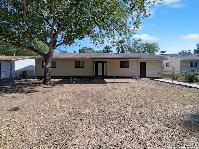 rear view of house featuring a patio