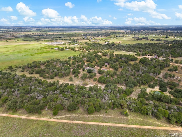 birds eye view of property featuring a rural view