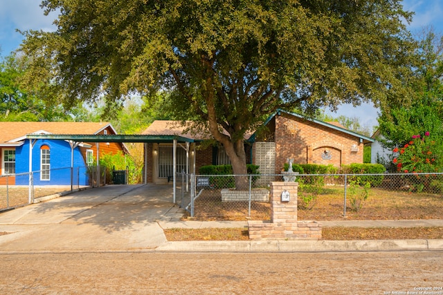 view of front facade featuring a carport